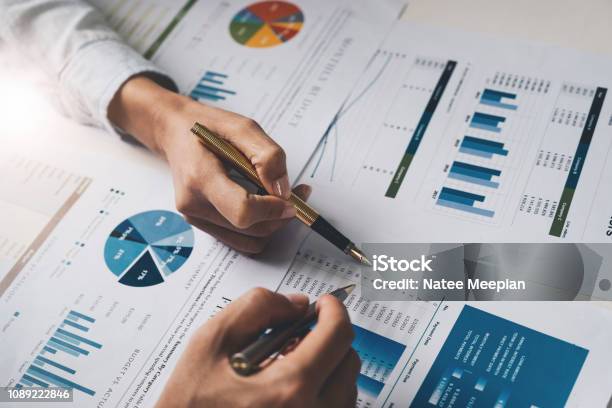 Close Up Business People Meeting To Discuss The Situation On The Market Business Financial Concept Stock Photo - Download Image Now
