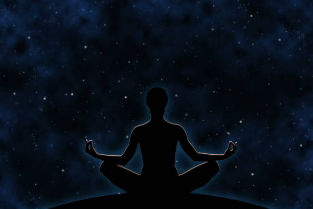Female yoga figure against universe background, meditation.