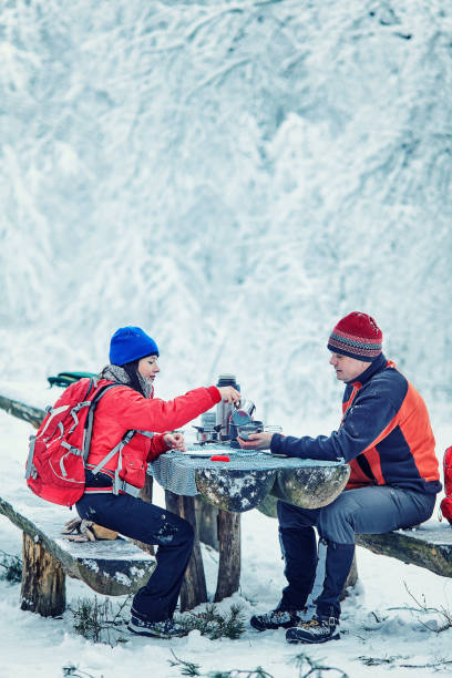 istock Tourists on a halt in the winter forest 1089262048