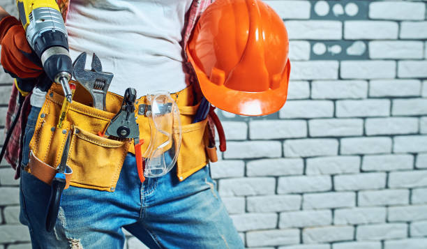 istock Girl builder in special clothes at the workplace. 1089262172