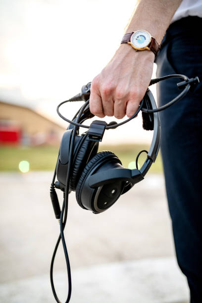 Headphones in pilot's hand