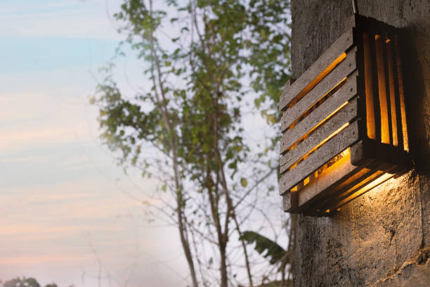 istock Diy wood lamp on wall in morning time. 1089267548