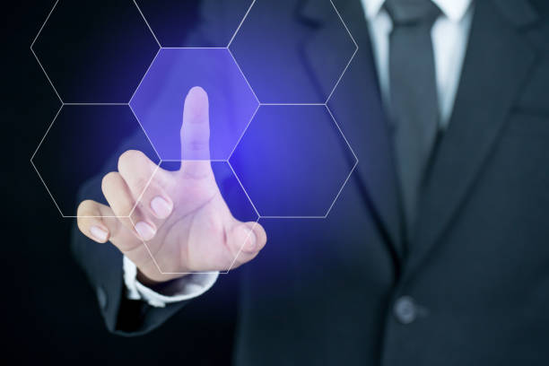 istock Businessman pointing his finger on hexagon button 1089274948