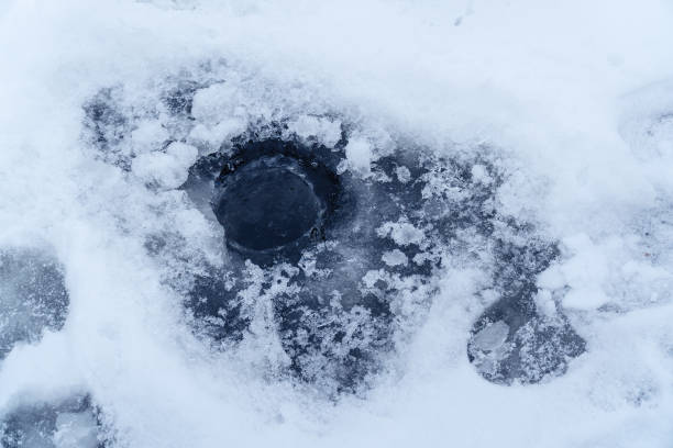 istock Ice hole for winter fishing 1089275150