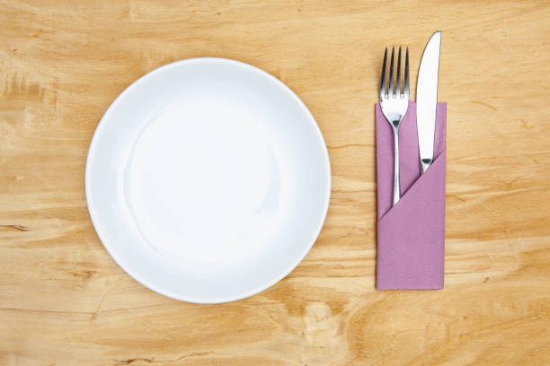 istock White plate on the wooden table. 1089282308