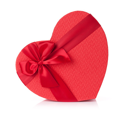 Valentines day red gift box. Heart shape. Isolated on white background