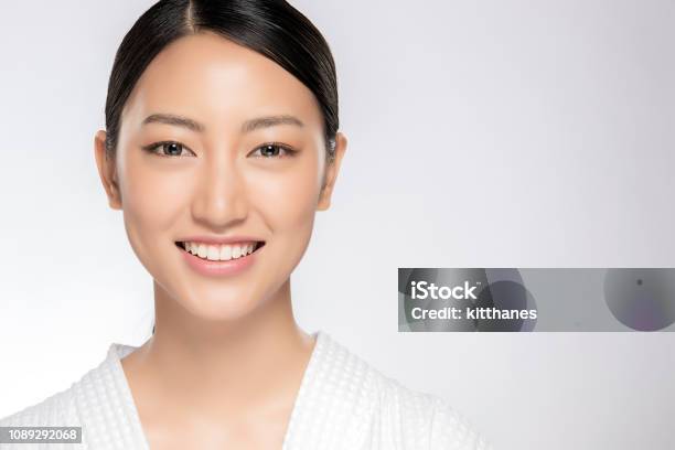 Beautiful Smiling Woman With Clean Skin Stock Photo - Download Image Now - Asian and Indian Ethnicities, Beauty, Human Face