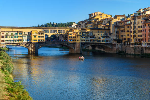 istock Ponte Vecchio Bridge over river Arno at sunny day. Florence. Italy 1089292236