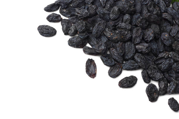 istock black raisins isolated on white background. top view 1089292348