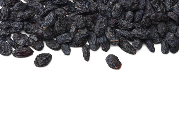 istock black raisins isolated on white background. top view 1089292350