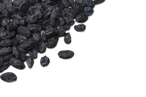 istock black raisins isolated on white background. top view 1089292364