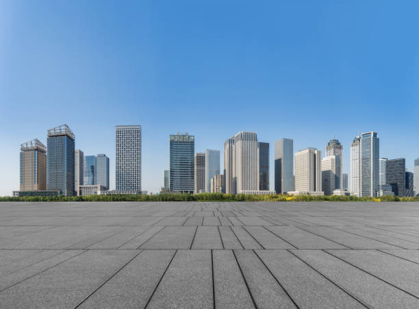 istock empty pavement and modern buildings in city 1089294076