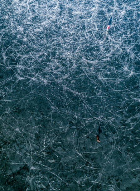 istock Ice skating on frozen lake 1089297424