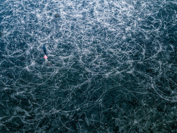 istock Ice skating on frozen lake 1089297490