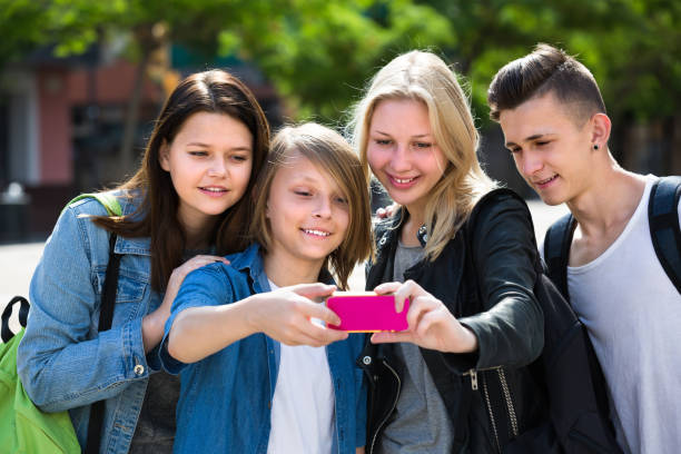 istock Teenagers doing selfie outdoors 1089297900