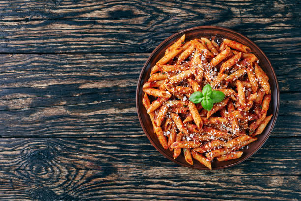 istock italian penne arrabiata in a clay bowl 1089299788