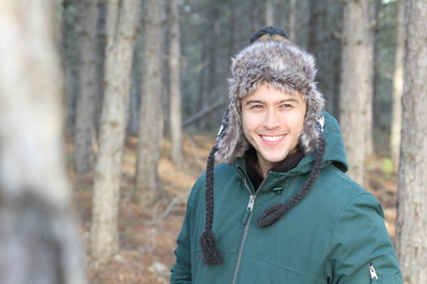 Hispanic man in the winter with copy space.