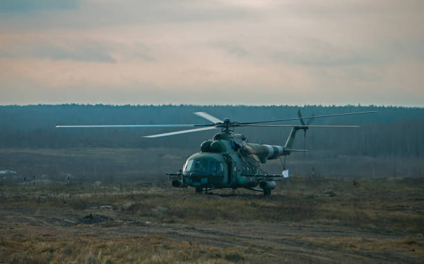 Military helicopter stands at the war field