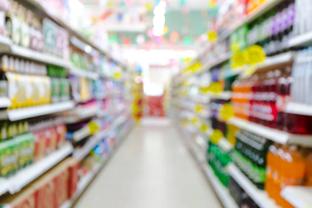abstract blurred supermarket  interior shot aisle with empty - department store imagens e fotografias de stock