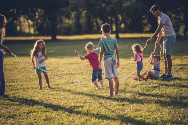 istock Group of children playing in public park 1089317006