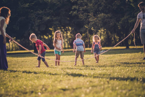 istock Group of children playing in public park 1089317230