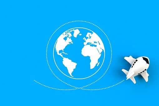 Close up of airplane flying around the world concept illustration on blue background, Top view with copy space, 3d rendering