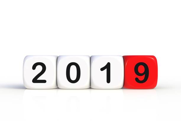 istock Christmas and Happy New Year 2019 concept with dice, 3D rendering isolated on white background. 1089317888