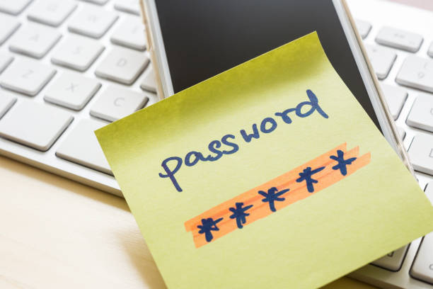 istock Secret password note on smart phone and keyboard. 1089318122