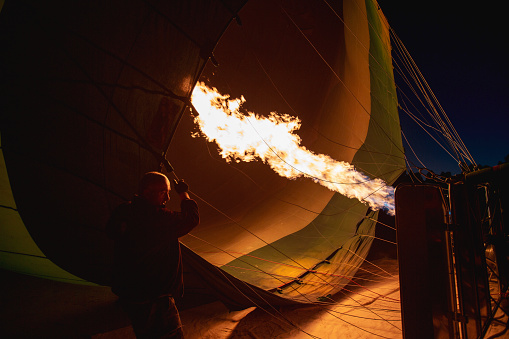 Cappadocia, Turkey -February 12, 2017: Hot-air balloons preparing for takeoff on February, 12, 2017 in Cappadocia, Turkey