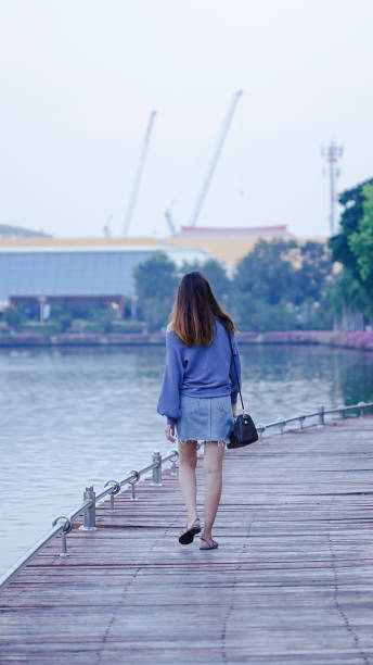 istock Women walking on wooden bridges 1089325100