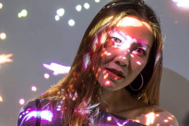 istock girl standing in the beautiful bokeh light 1089327240