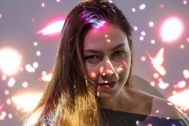 istock girl standing in the beautiful bokeh light 1089327276