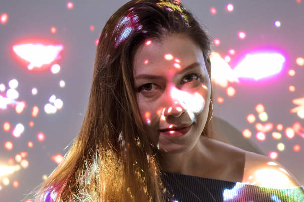 istock girl standing in the beautiful bokeh light 1089327284