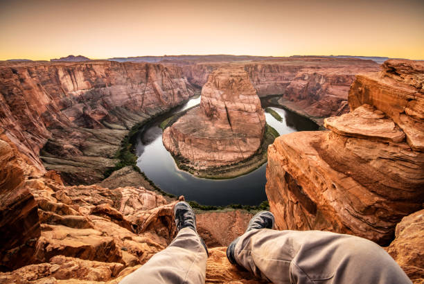 Man living on the edge at the horseshoe bend. Page, Arizona. USA