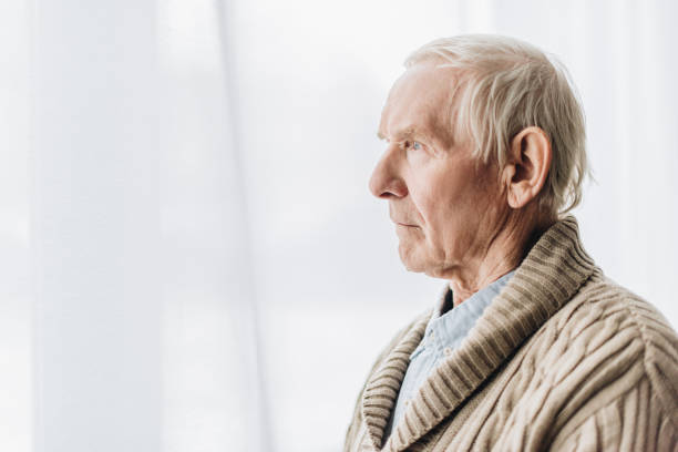 istock sad senior man with dementia disease at home 1089332938