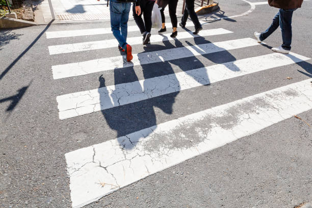 istock Walking people and long shadows 1089337118