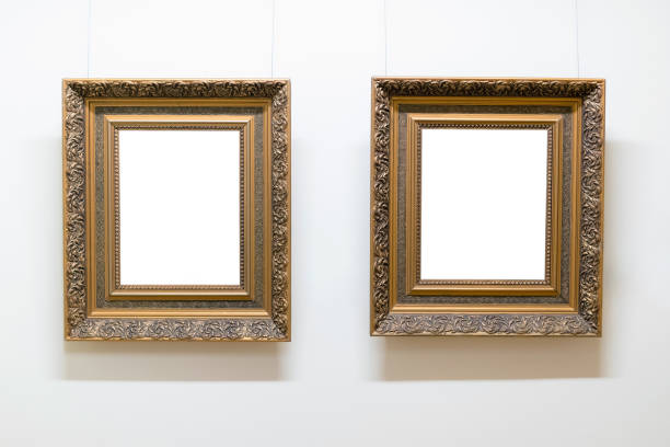istock Blank empty frames hanging on museum wall. Art gallery, museum exhibition white clipping path. 1089338340