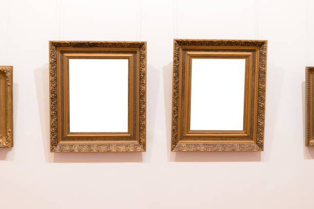 istock Blank empty frames hanging on museum wall. Art gallery, museum exhibition white clipping path. 1089338346