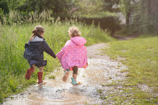 istock Girls playing in mud 1089346172