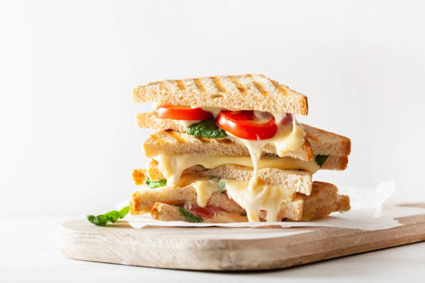 istock grilled cheese and tomato sandwich on white background 1089346652