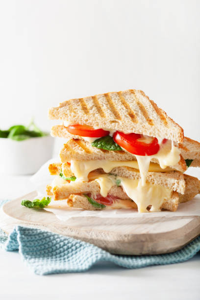 istock grilled cheese and tomato sandwich on white background 1089346814