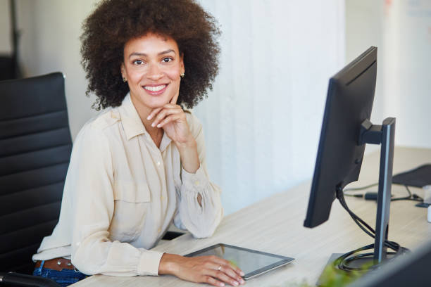 istock Mixed race employee posing in office. 1089348648