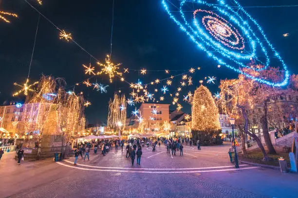 Prešeren square in Ljubljana City Centre with big Christmas tree, Christmas lights and decoration at night.