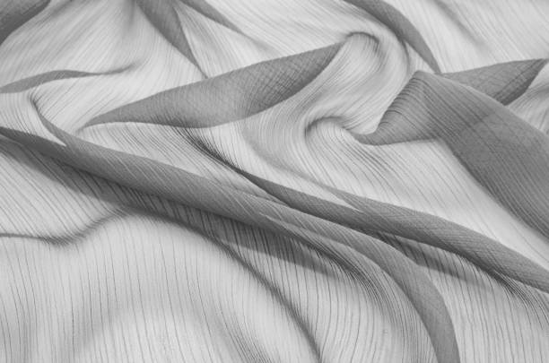 istock Texture chiffon fabric gray color for backgrounds 1089357842