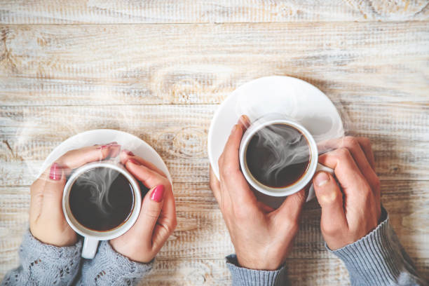 istock Cup drink for Breakfast in the hands of lovers. Selective focus. 1089360370