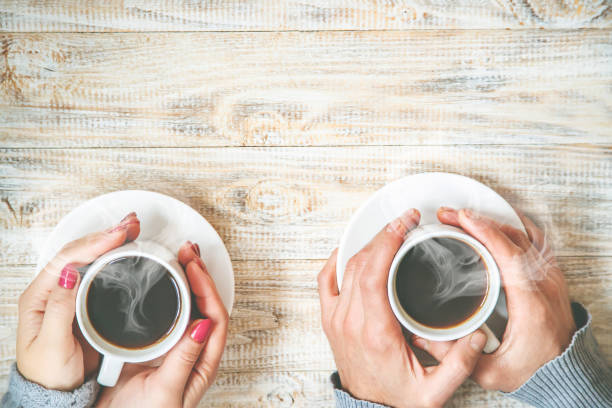 istock Cup drink for Breakfast in the hands of lovers. Selective focus. 1089360380