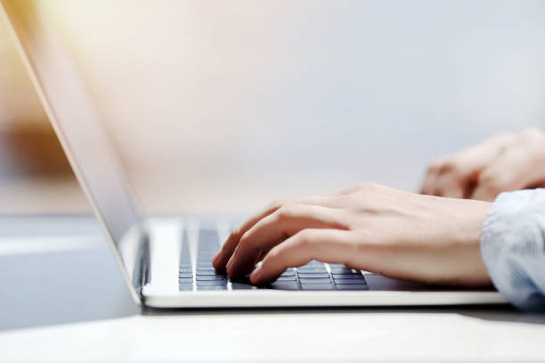istock Businessman working laptop for new architectural project. Generic design notebook on the table. Young businessman working with laptop at office. Unrecognizable man using a modern portable computer 1089360690