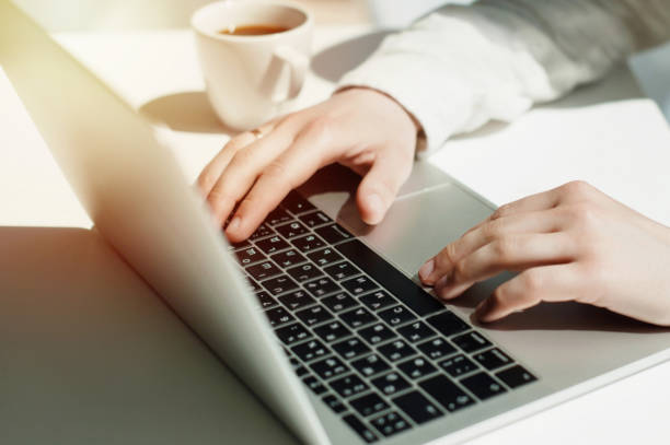 istock Businessman working laptop for new architectural project. Generic design notebook on the table. Young businessman working with laptop at office. Unrecognizable man using a modern portable computer 1089360864