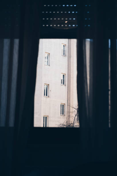 istock facade view from interior room - phobia solitude depression concept. 1089360974