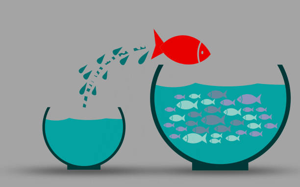 istock Fish in fishbowl jumps to his friends 1089361702